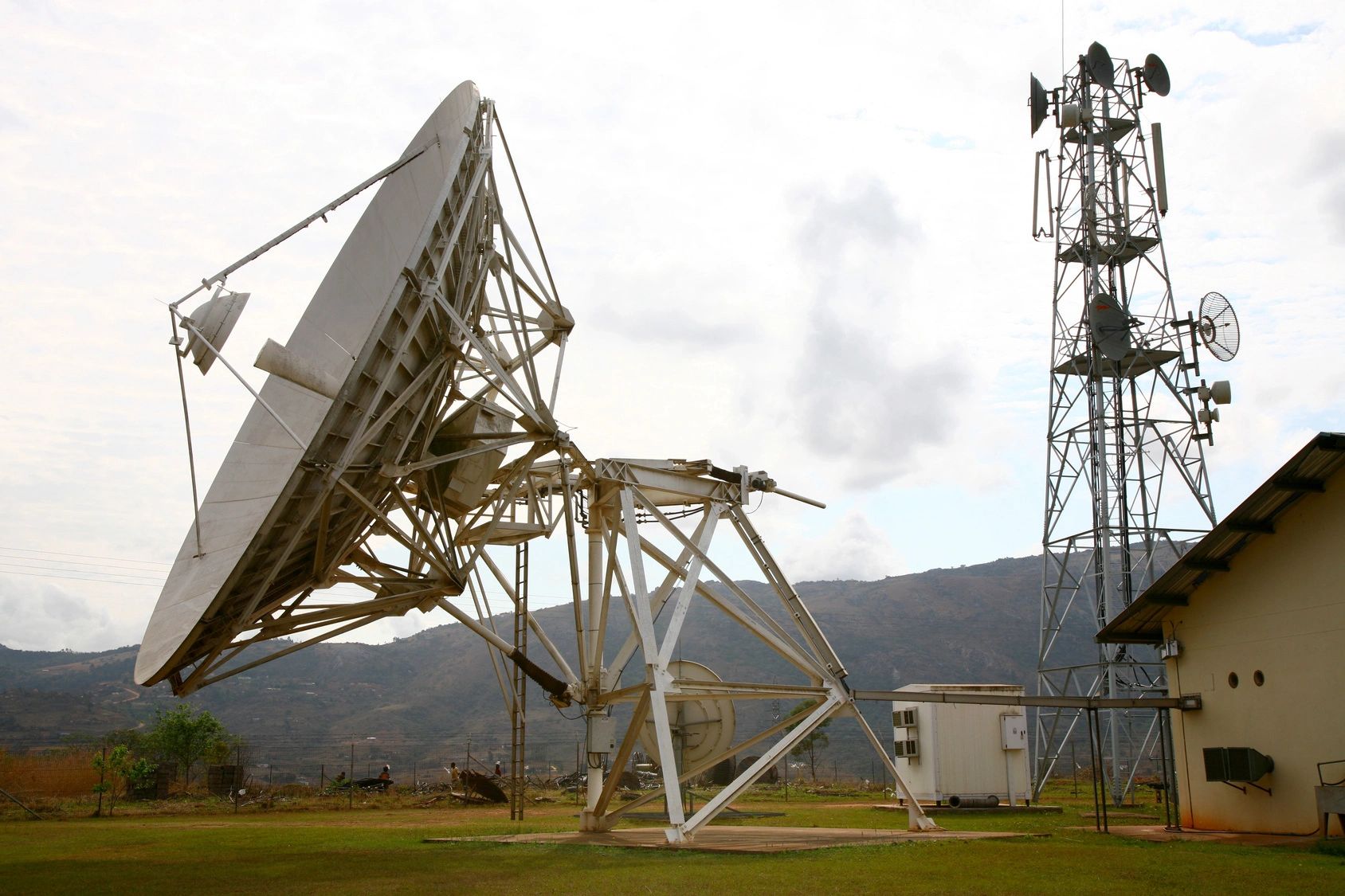 Satellite uplink dish and transmission tower